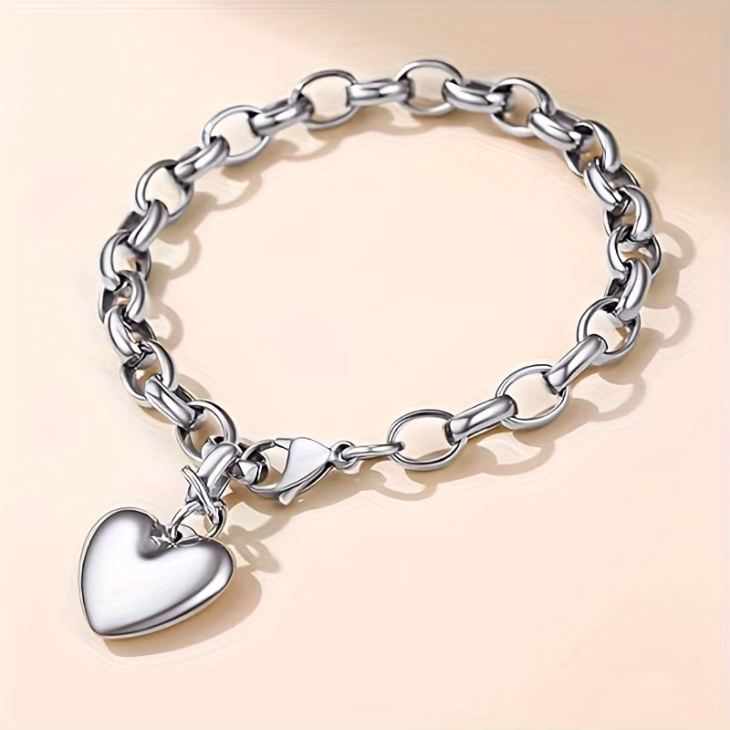 Pulsera de acero inoxidable con dije